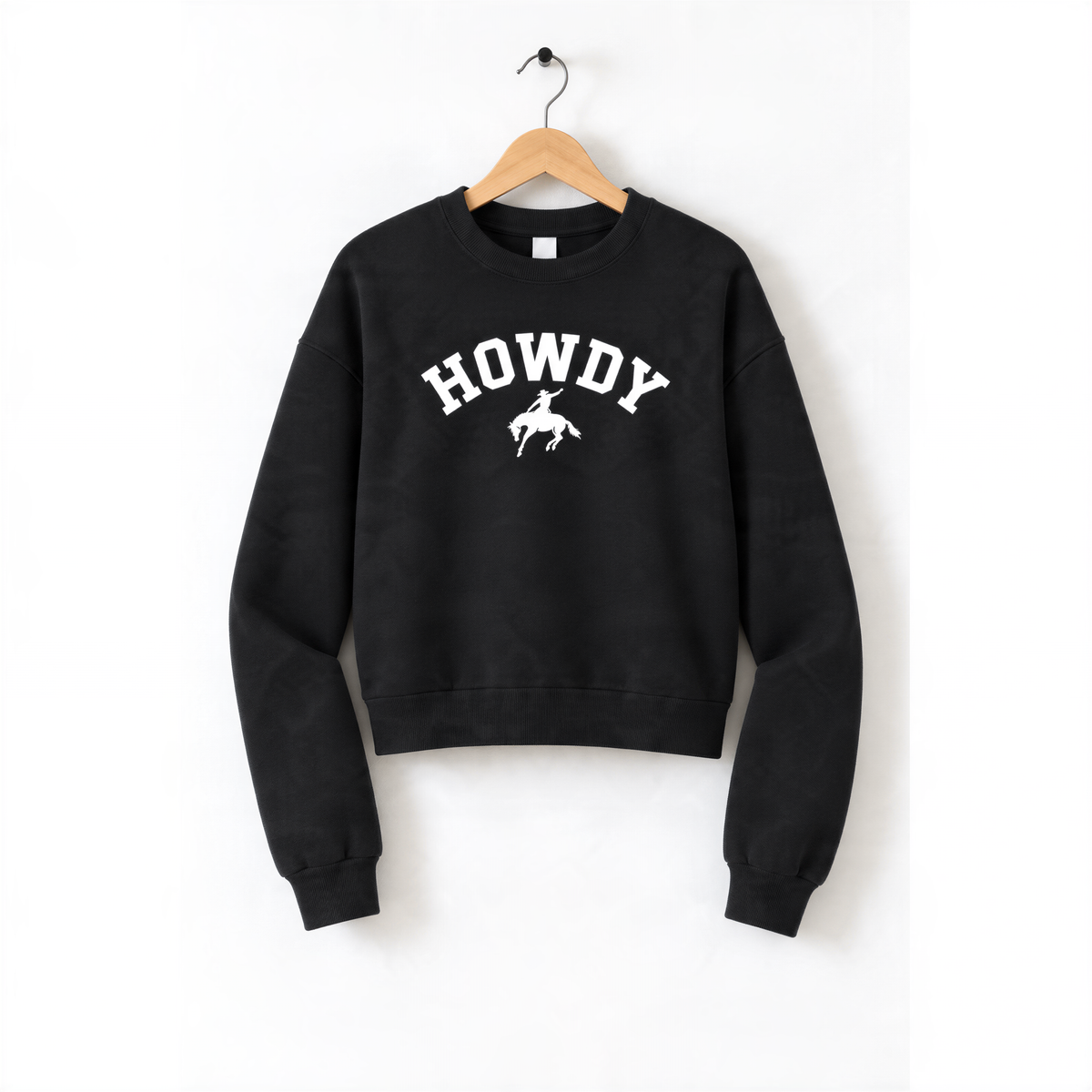 A black sweatshirt with the word "HOWDY" printed on it in white letters.
