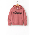 A pink hoodie with a graphic of mountains and trees printed on it, hanging on a wooden hanger.