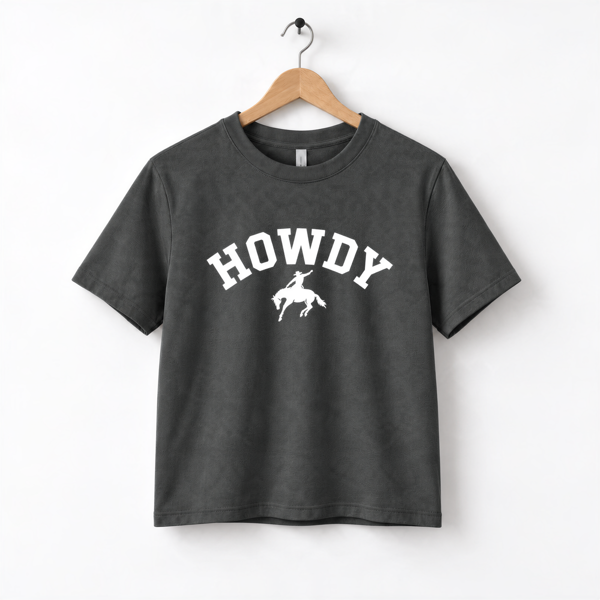 A gray t-shirt with the word "HOWDY" printed in white letters.