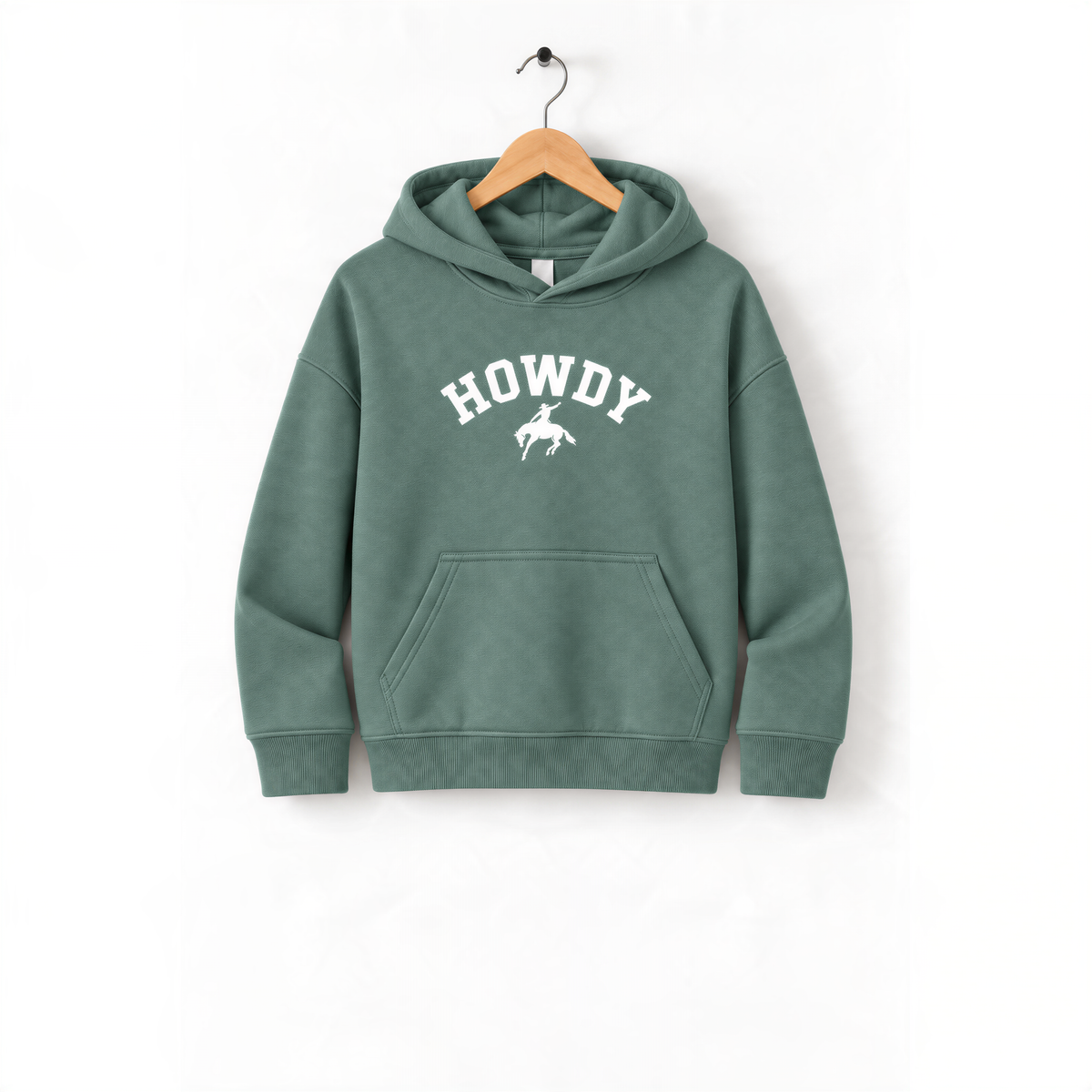 A green hoodie with the word "HOWDY" printed on it, hanging on a wooden hanger.