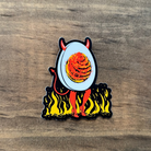 Sticker of noodles with a bowl on a wooden surface