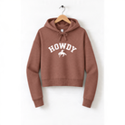 A brown hoodie with the word "HOWDY" printed on it, hanging on a wooden hanger.