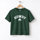 A dark green t-shirt with the word "HOWDY" printed in white letters.