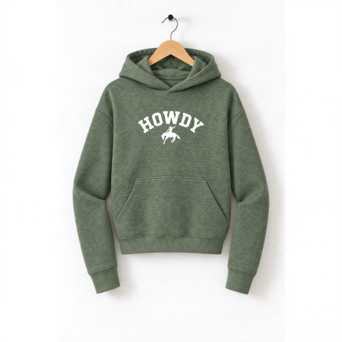 A green hoodie with the word "HOWDY" printed on it, hanging on a wooden hanger.
