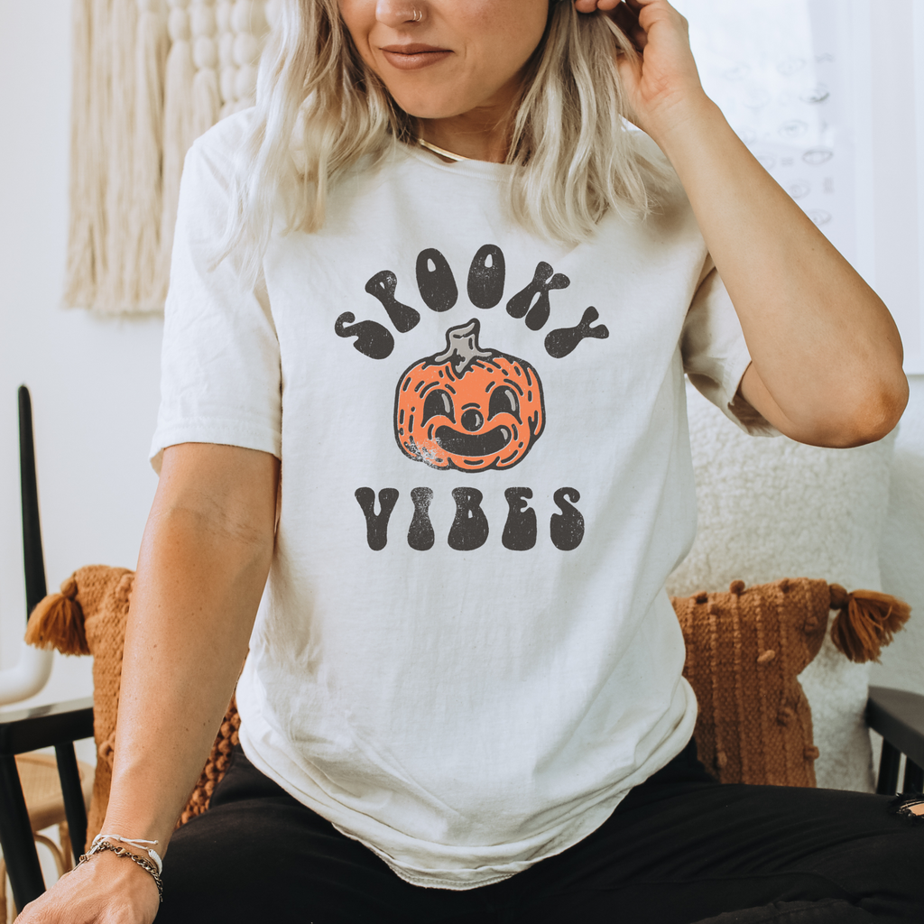 Spooky Vibes Halloween t-shirt with pumpkin jack-o’-lantern face