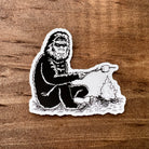Bigfoot Roasting Marshmallow Sticker-Sticker-208 Tees- 208 Tees, A Women's, Men's and Kids Online Graphic Tee Boutique, Located in Spirit Lake, Idaho