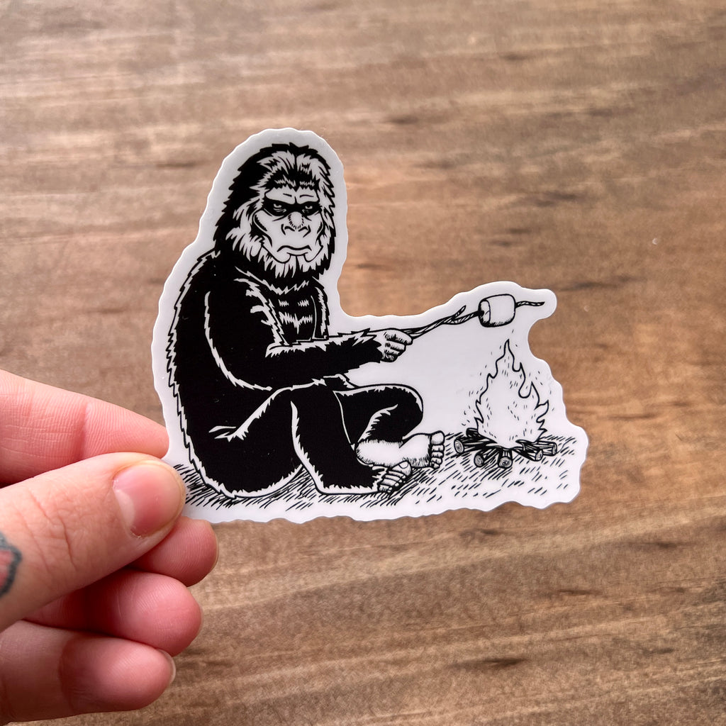 Bigfoot Roasting Marshmallow Sticker-Sticker-208 Tees- 208 Tees, A Women's, Men's and Kids Online Graphic Tee Boutique, Located in Spirit Lake, Idaho